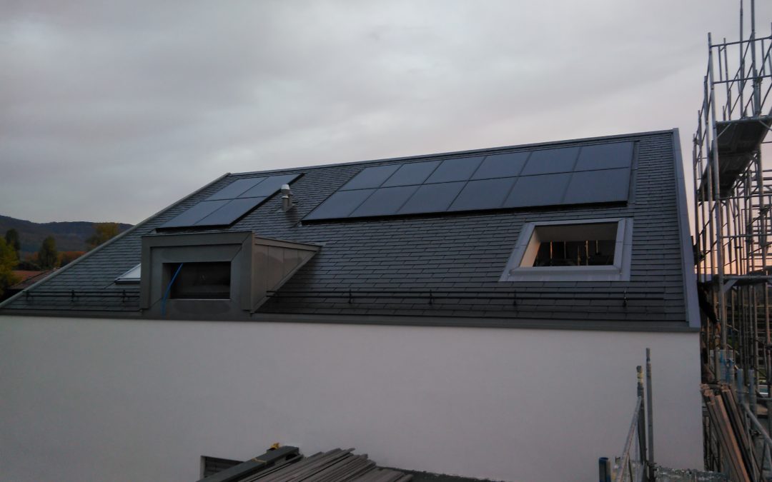 Installation 16 modules solaires en intégré à Chéserex (2 toitures)